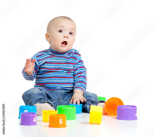 Funny little child playing ...