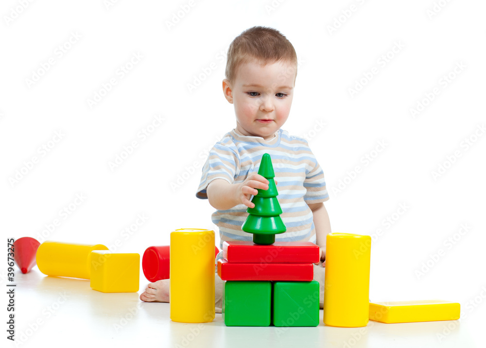 little boy playing with building blocks little boy playing with building blocks