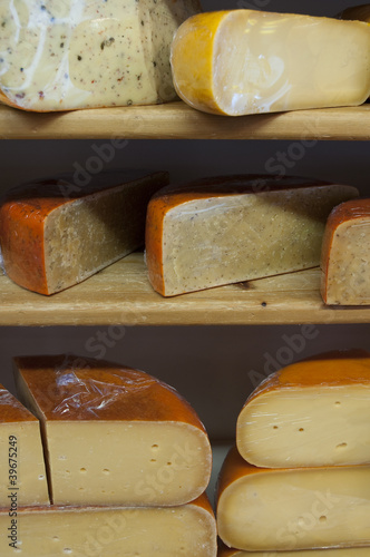 Cheese on shelves in store