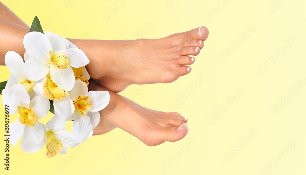 Woman feet with flower.