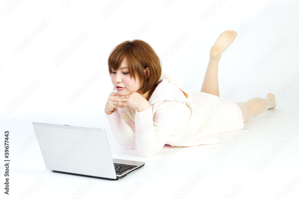 Beautiful asian woman using a laptop computer Beautiful asian woman using a laptop computer