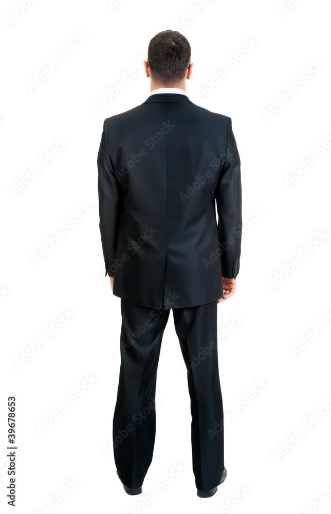Businessman standing with his back to the studio Businessman standing with his back to the studio