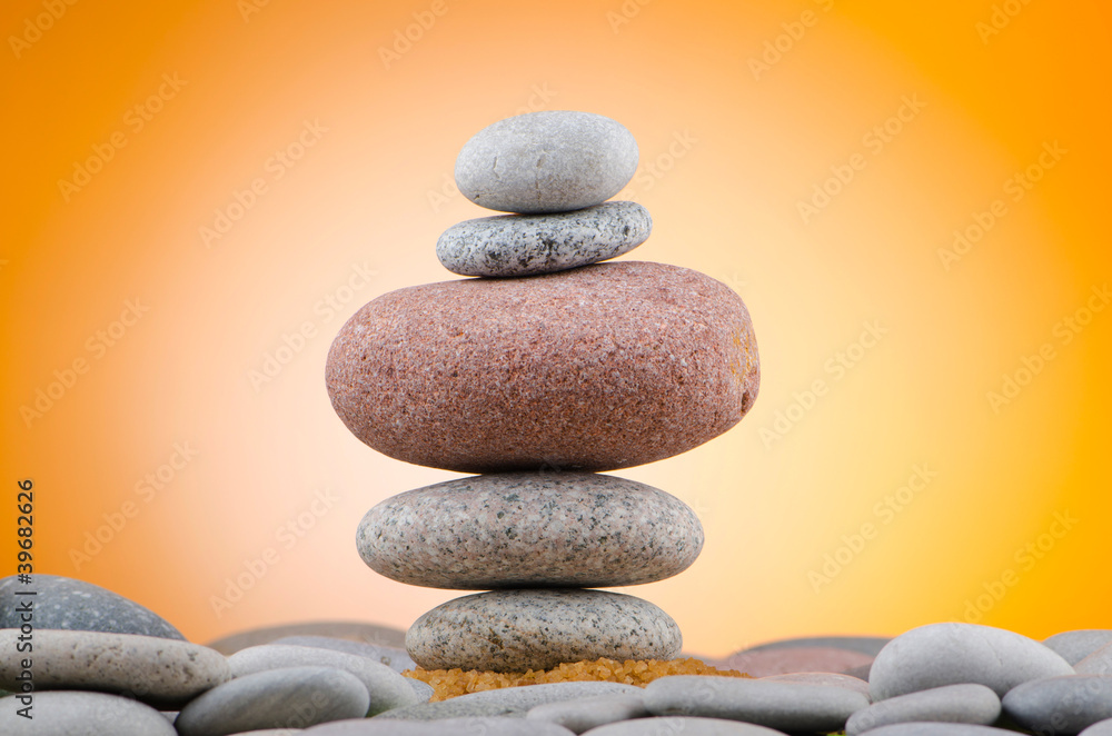 Balanced pebbles with colour background Balanced pebbles with colour background
