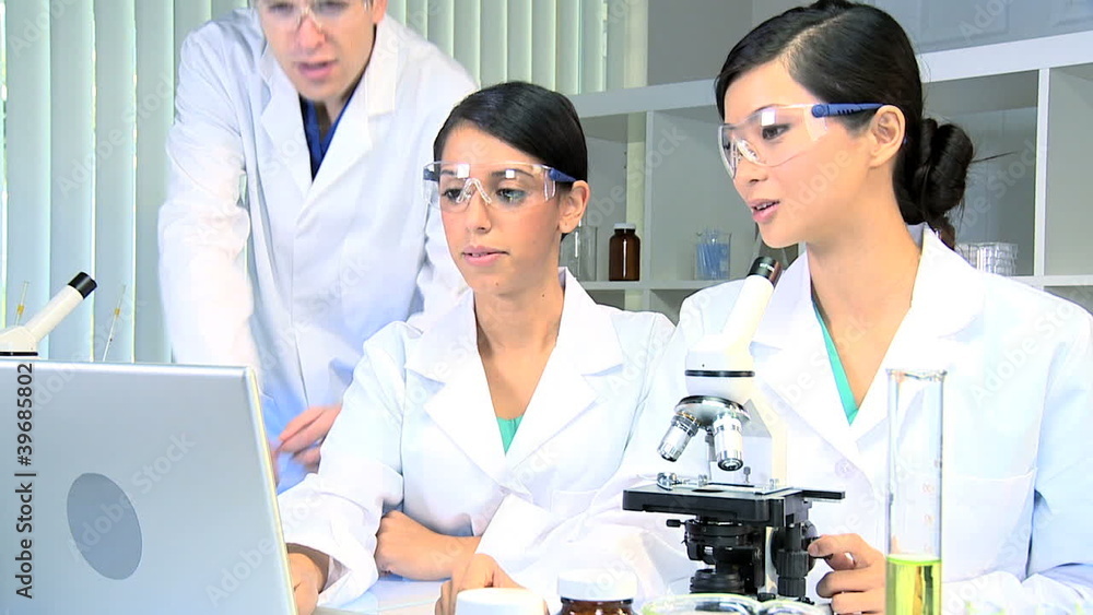 Male Doctor in Laboratory with Medical Students Male Doctor in Laboratory with Medical Students