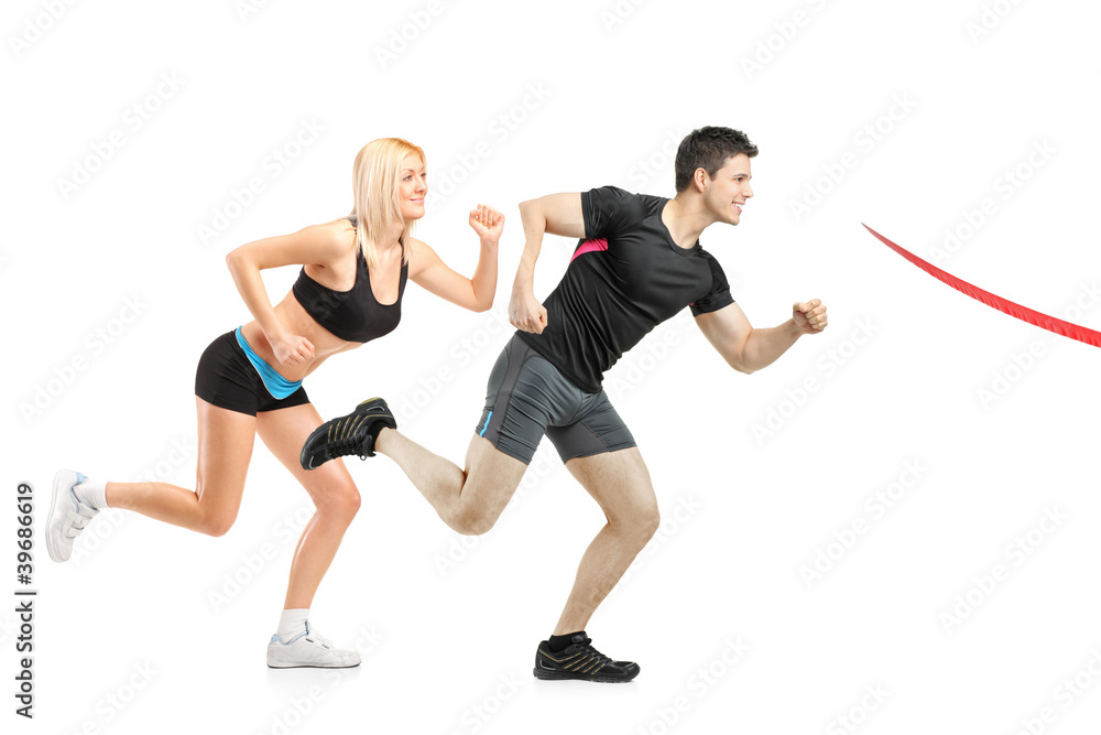 Athletes running towards a finish line Athletes running towards a finish line