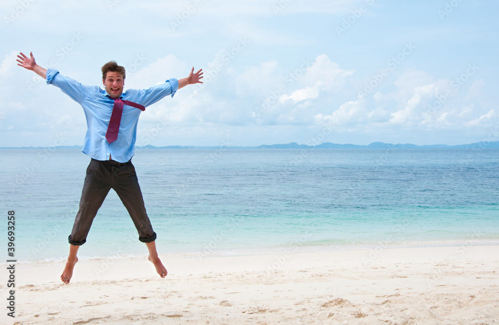 Funny business man jumping on the beach Funny business man jumping on the beach