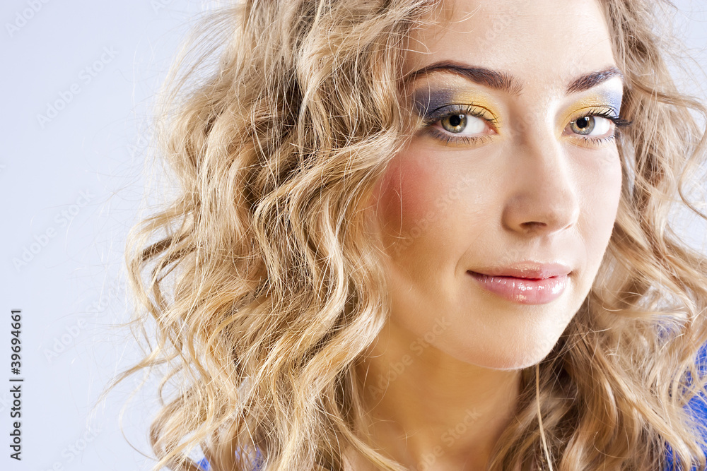 Curly blonde with bright makeup Curly blonde with bright makeup