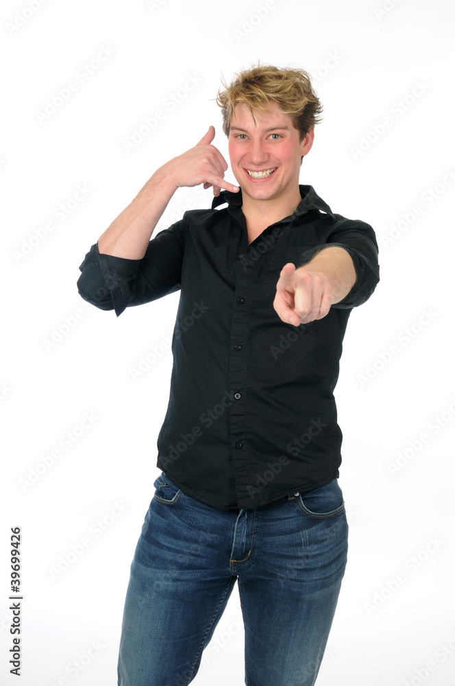 Young mann gesturing to call him Young mann gesturing to call him