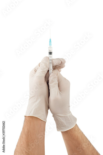 Doctor hands with gloves holding medical syringe isolated