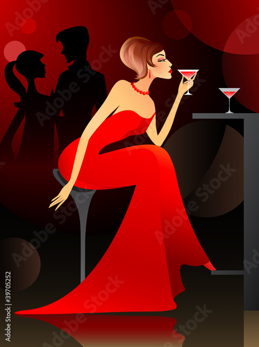 Woman having cocktail at the bar