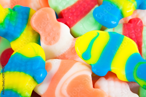 Candy assortment background. Colorful fish shaped photo
