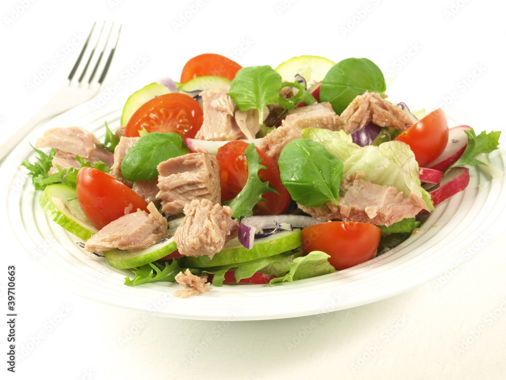 Salad with tuna, tomatoes, basil and onion. Salad with tuna, tomatoes, basil and onion.