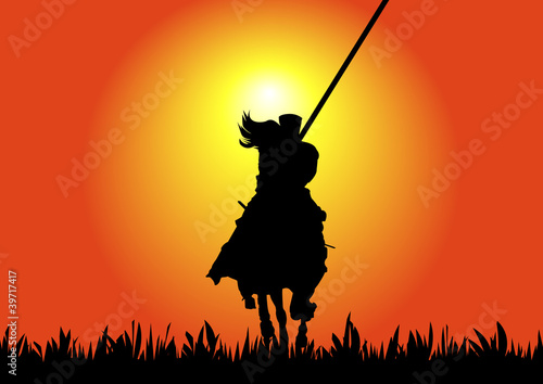 Horse riding warrior at sunset