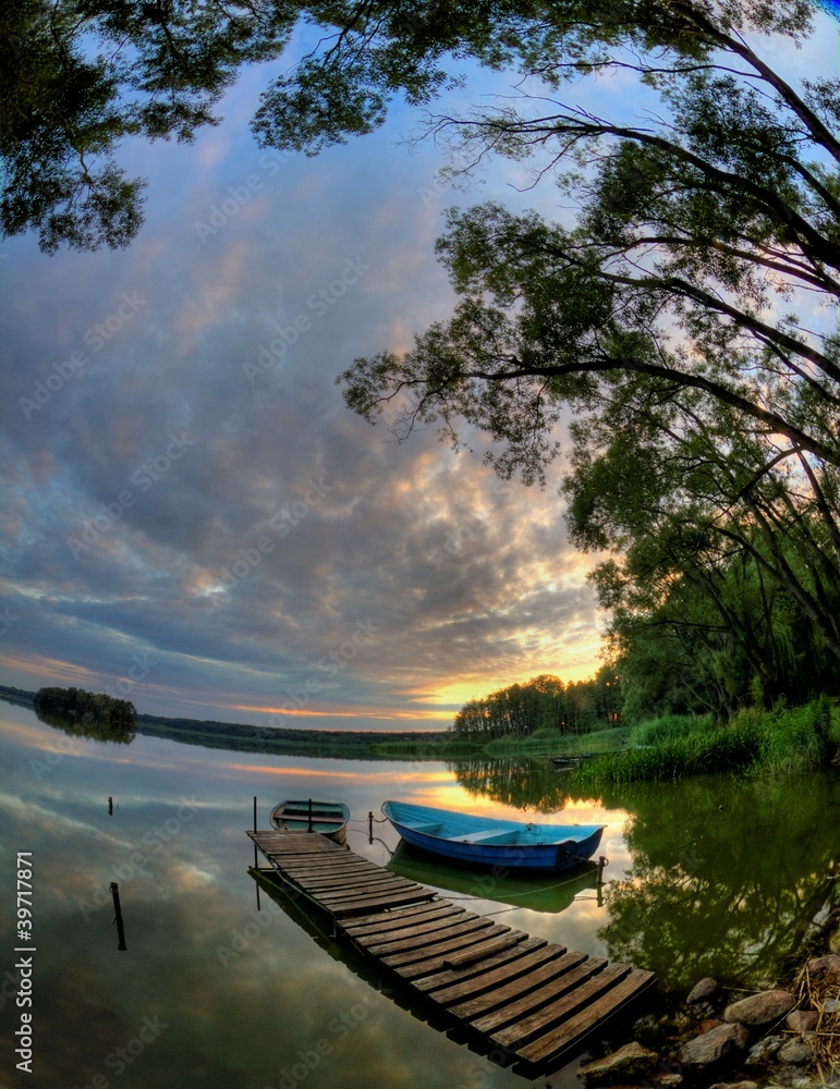 Obraz premium sunset and boat
