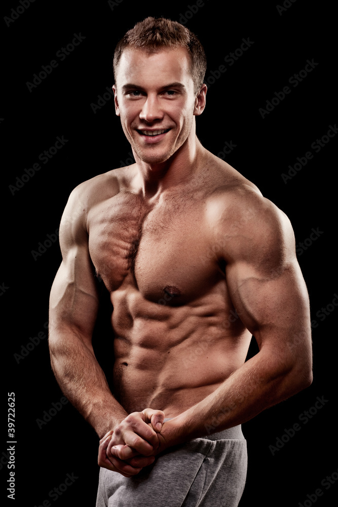 Fototapeta premium handsome young muscular sports man
