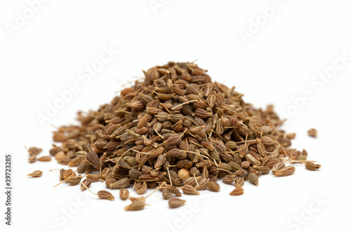 Photos pile of anise isolated on white background