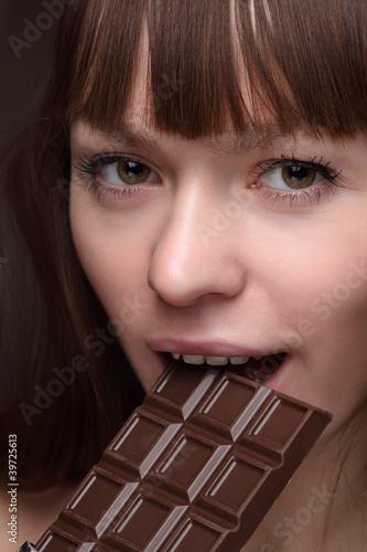 Beauty girl with chokolate bar