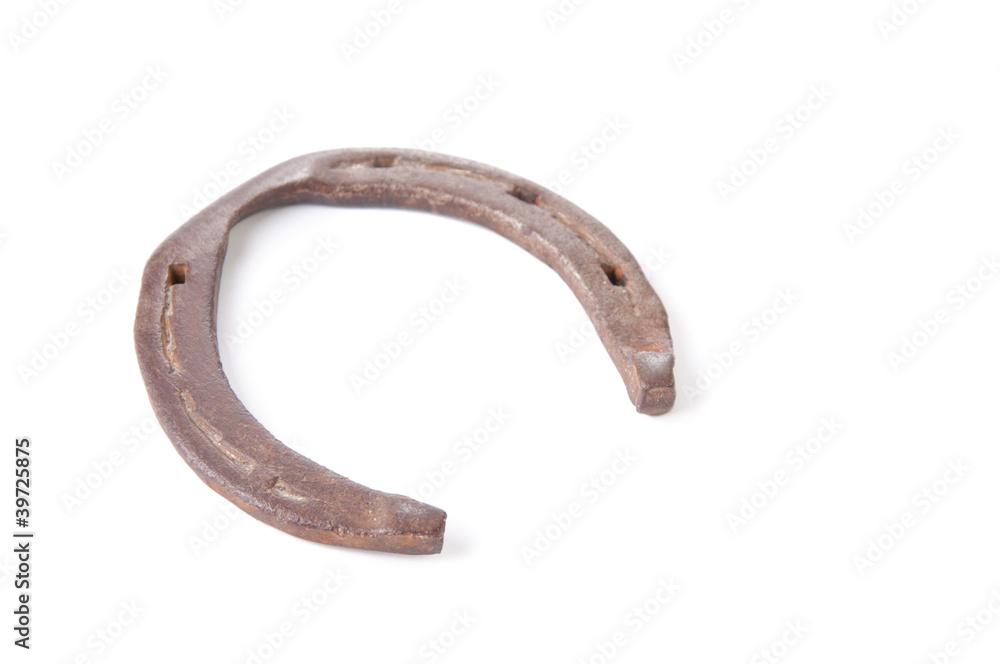Old rusty horseshoe, isolated over white, copyspace Old rusty horseshoe, isolated over white, copyspace