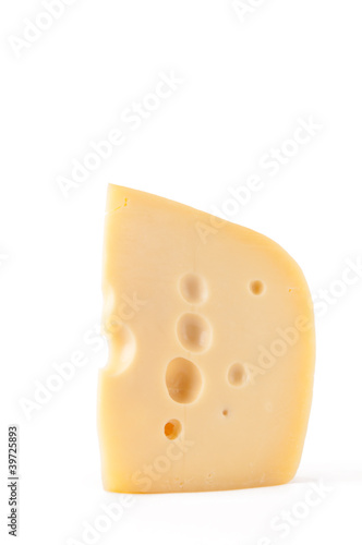 Piece of Maasdam cheese, isolated over white