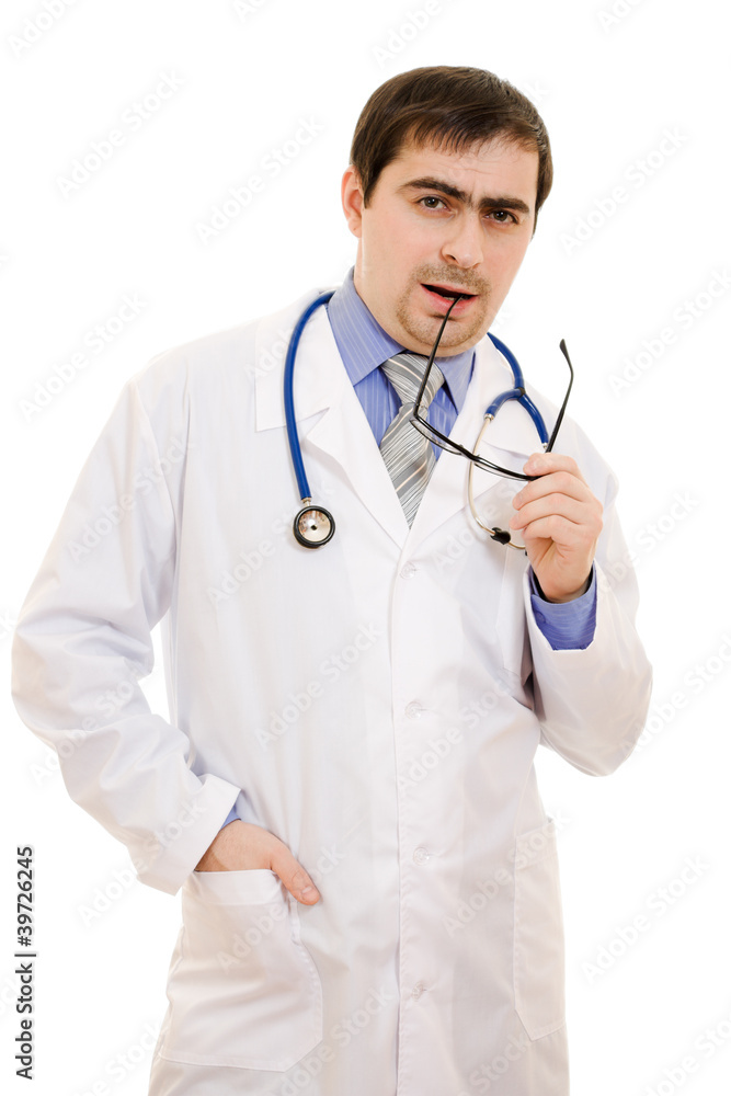 A doctor with a stethoscope and glasses thinking A doctor with a stethoscope and glasses thinking