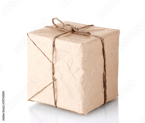 Small parcel wrapped in brown paper tied with twine isolated