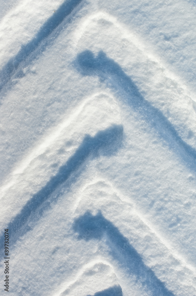 Print of a wheel of motor lorry on snow Print of a wheel of motor lorry on snow