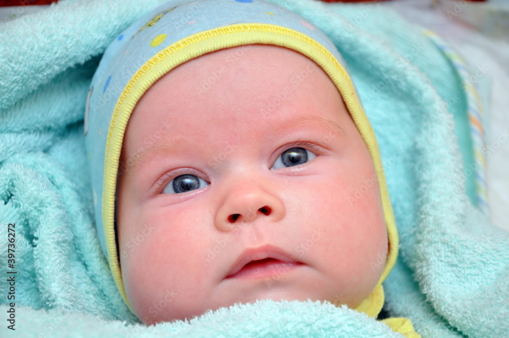 child in a towel child in a towel