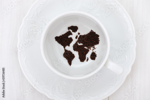 World map in coffee cup