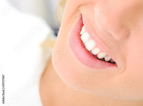 Healthy teeth  beautiful smile  young woman