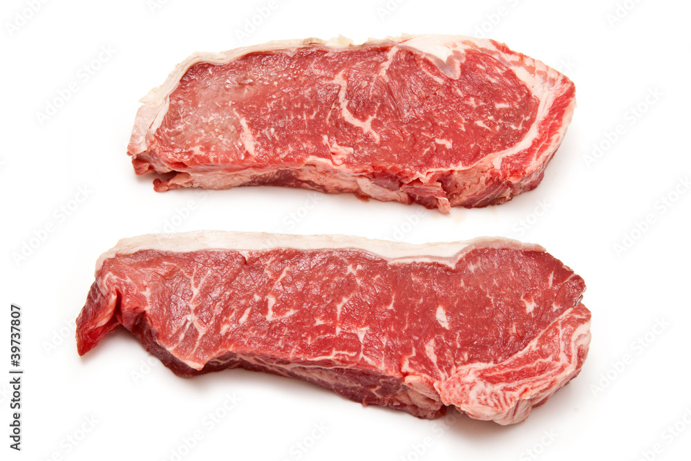 Sirloin steaks (beef) on a white studio background.