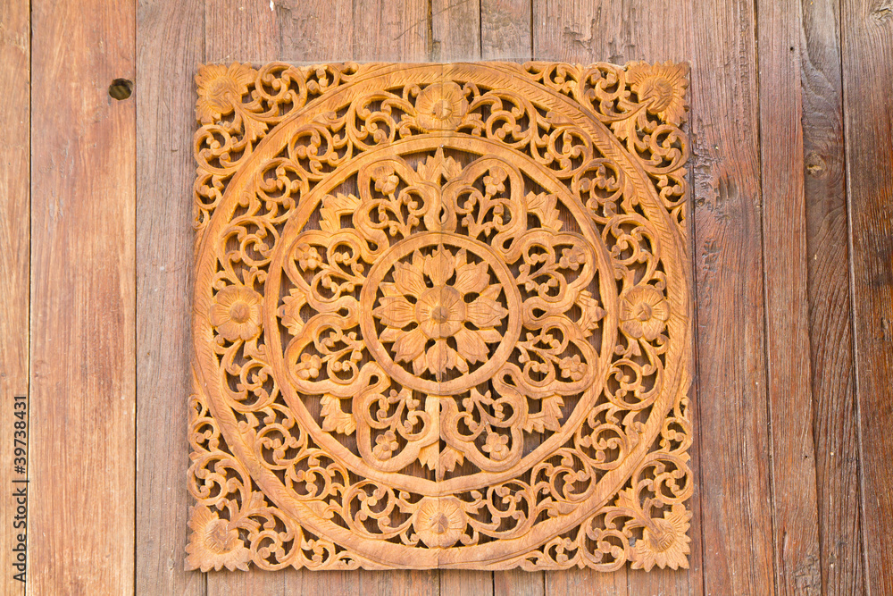 Pattern of flower carved on wood background Pattern of flower carved on wood background