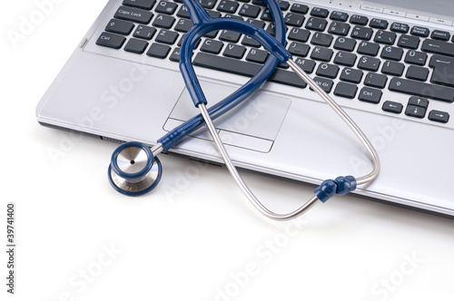 Stethoscope and computer with space for your text