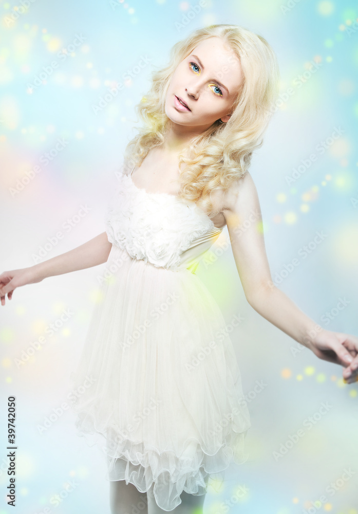 Beauty - attractive gentle blonde girl in white dress