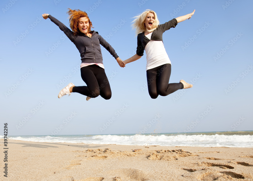 Two girls at outdoor near sea.