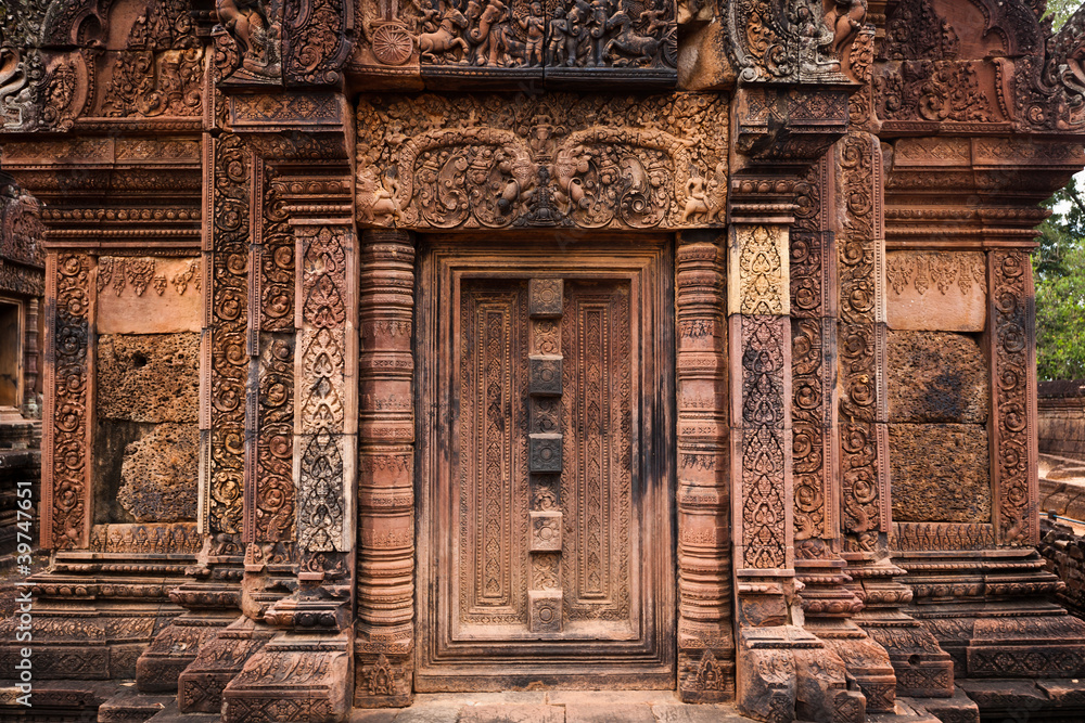 Intricate carved door of Angkor temple