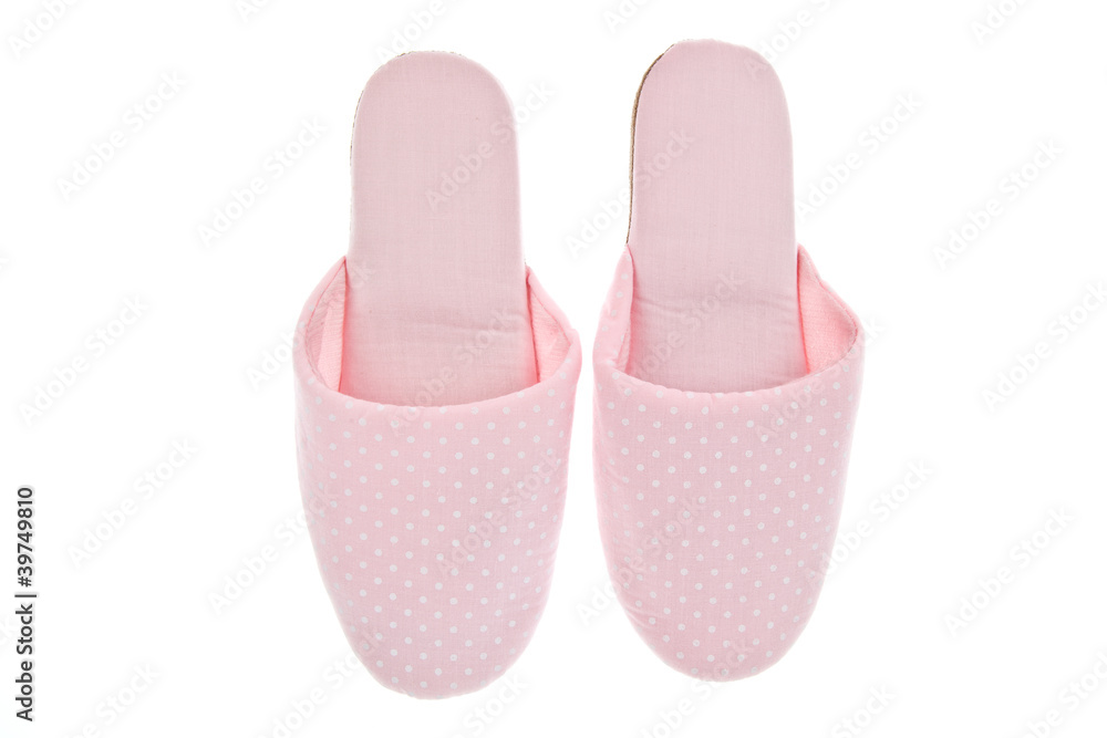 Pink slippers isolated on white background