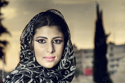 beautiful arabian lady wearing traditional islamic outfit