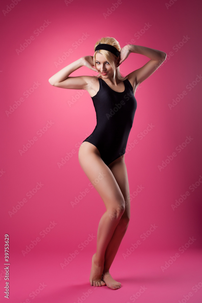 Beauty woman sport pin-up style on pink