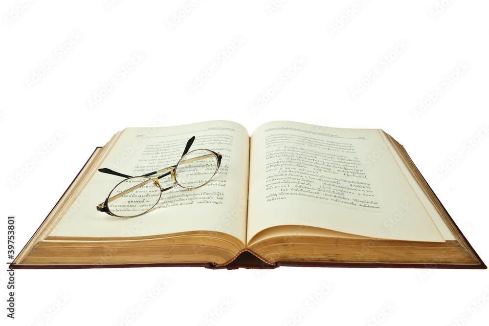 opened book with eye glasses isolated on white background opened book with eye glasses isolated on white background