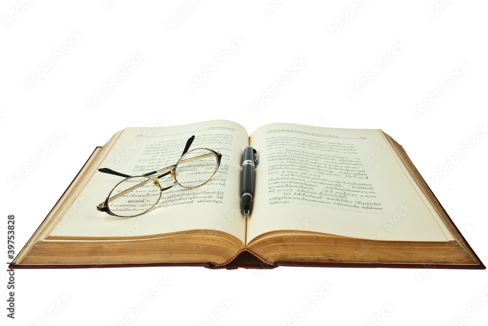 opened book with eye glasses and pen isolated on white backgroun opened book with eye glasses and pen isolated on white backgroun