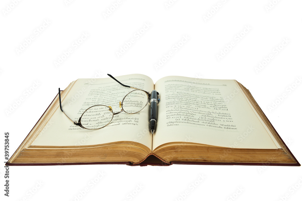 opened book with eye glasses and pen isolated on white backgroun opened book with eye glasses and pen isolated on white backgroun
