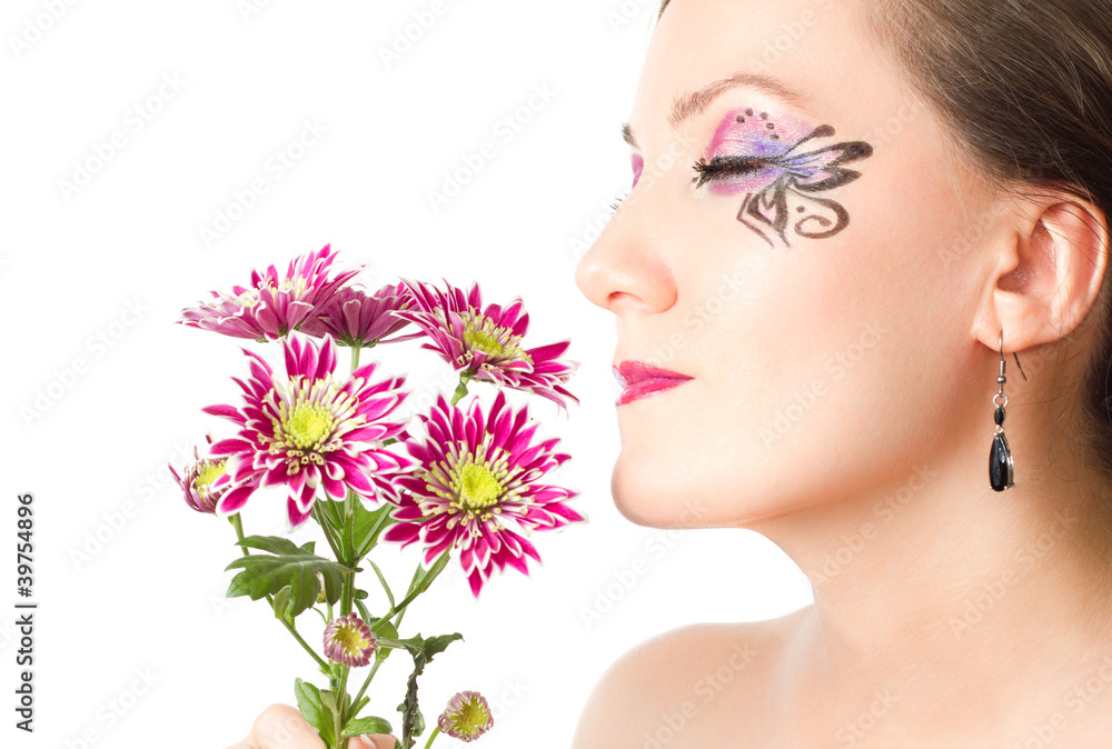 model woman with creative makeup and bouquet