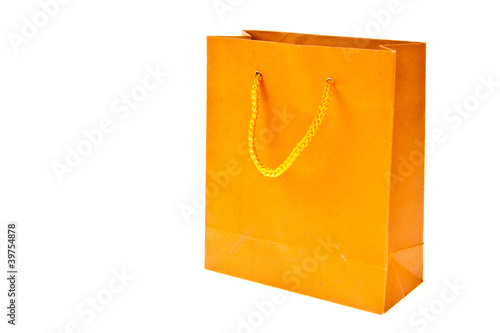 Orange paper bag isolated on white background