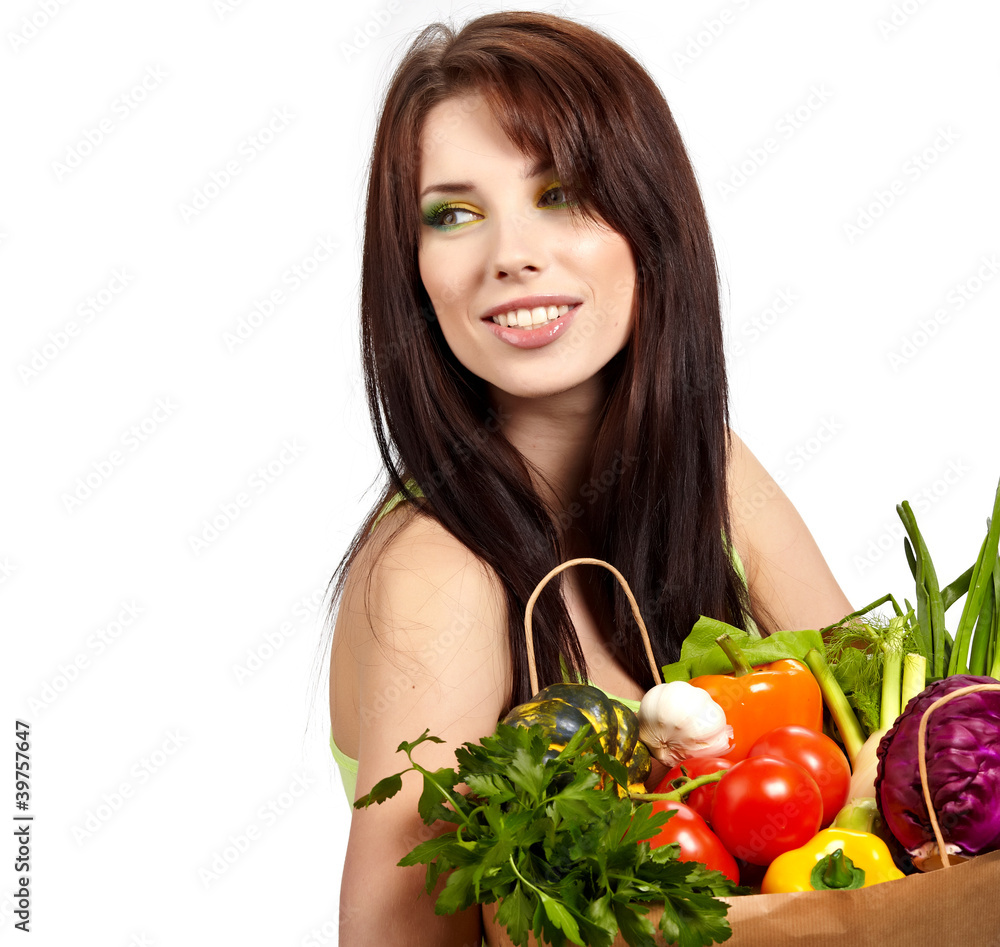 Happy young woman with vegetables. Happy young woman with vegetables.