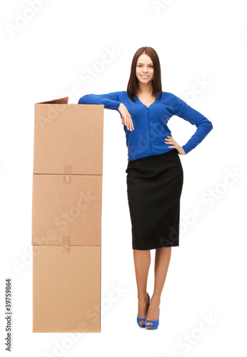 attractive businesswoman with big boxes