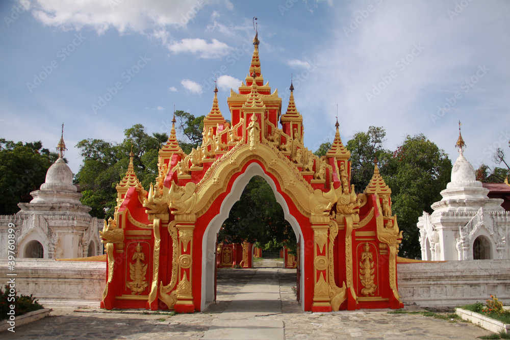 Red gate in Kuthodaw Paya in Mandalay, Myanmar