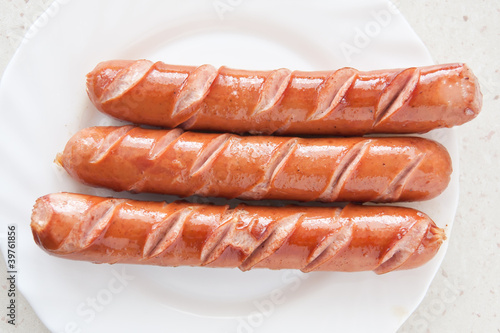 frankfurter sausage hot dog food at plate