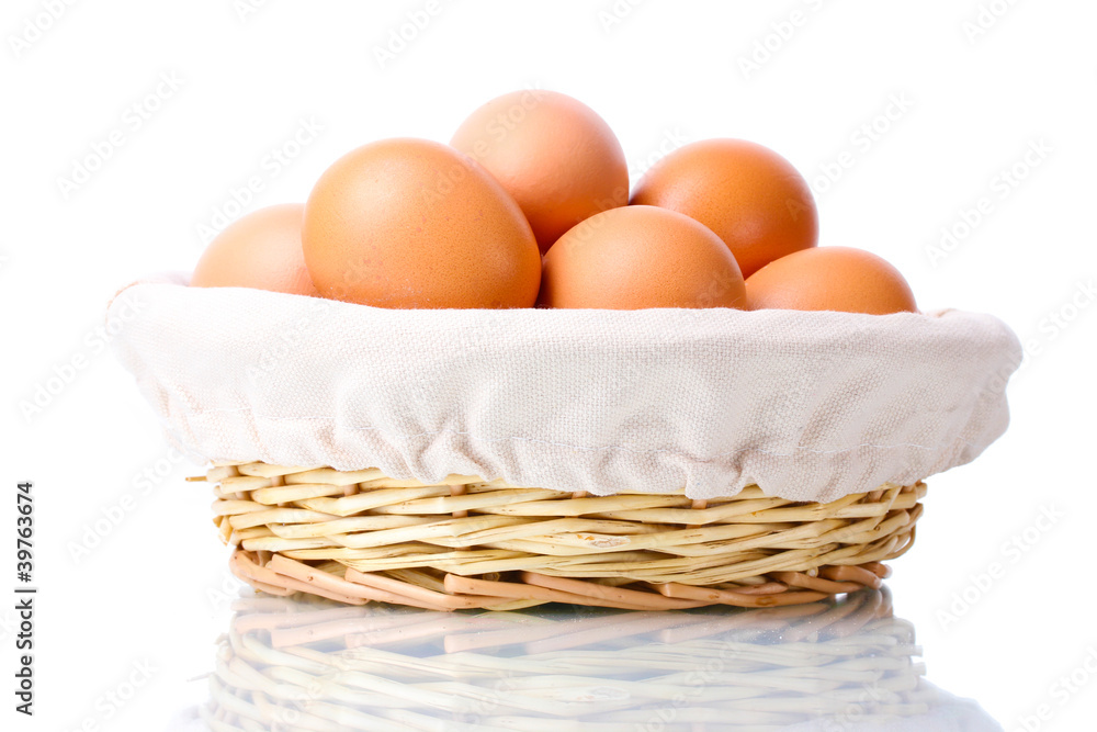 brown eggs in basket isolated on white brown eggs in basket isolated on white