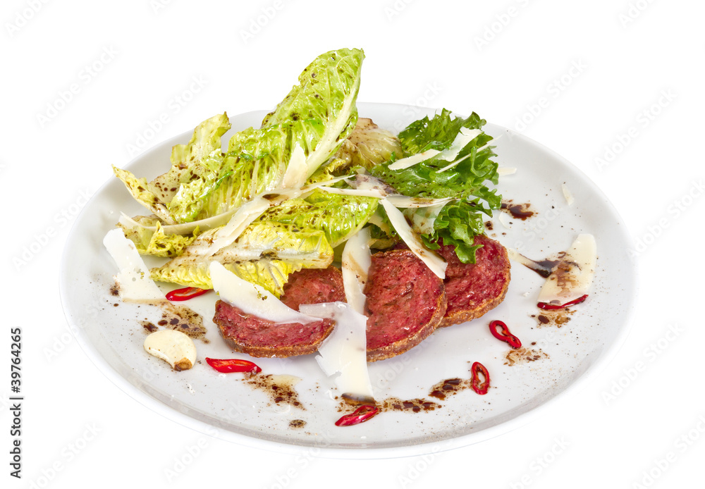 Salad from fried sausages, lettuce with sour cream sauce Salad from fried sausages, lettuce with sour cream sauce
