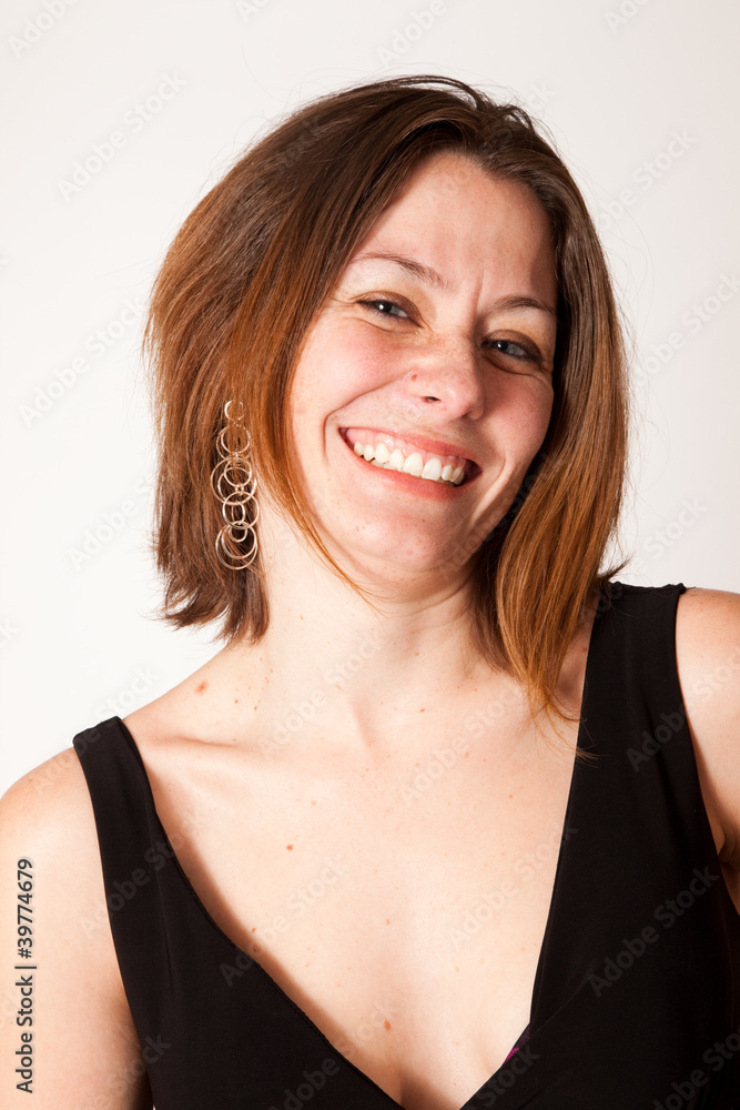 Pretty brunette smiling at the camera Pretty brunette smiling at the camera